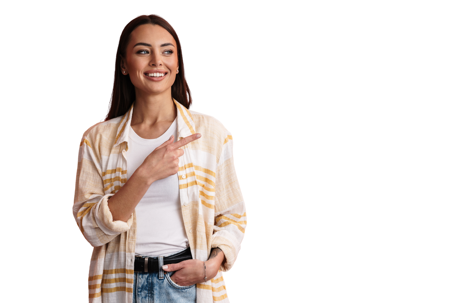 A woman in a beige and white striped shirt, white top and jeans pointing at the LinkedIn icon.